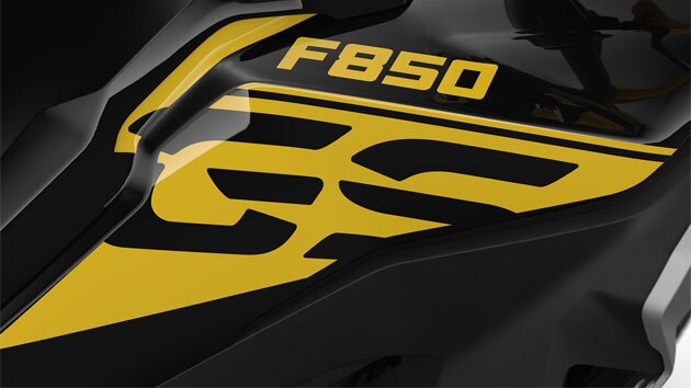 We see the black-yellow colour scheme in three-quarter view.